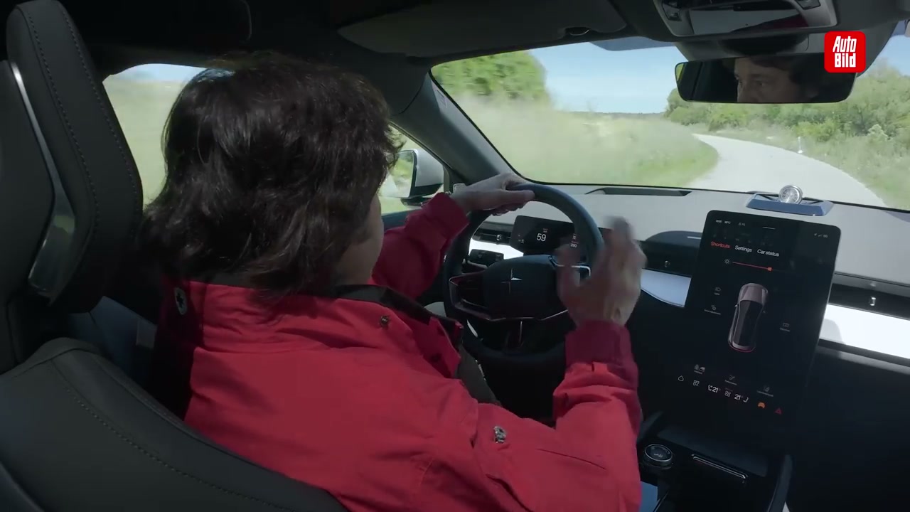 Vehicle ride height adjustment for off-road capability - Raising suspension to 27cm for forest road demonstration